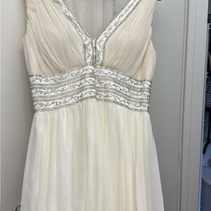 Elegant Cream Dress with Silver Accents